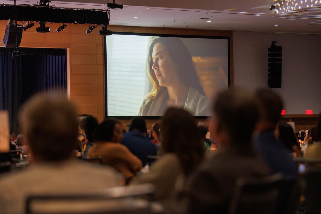 Laura's Story on screen at the Night for Life event